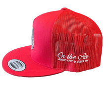 Load image into Gallery viewer, Jersey Evil Eye Trucker Hat on Red